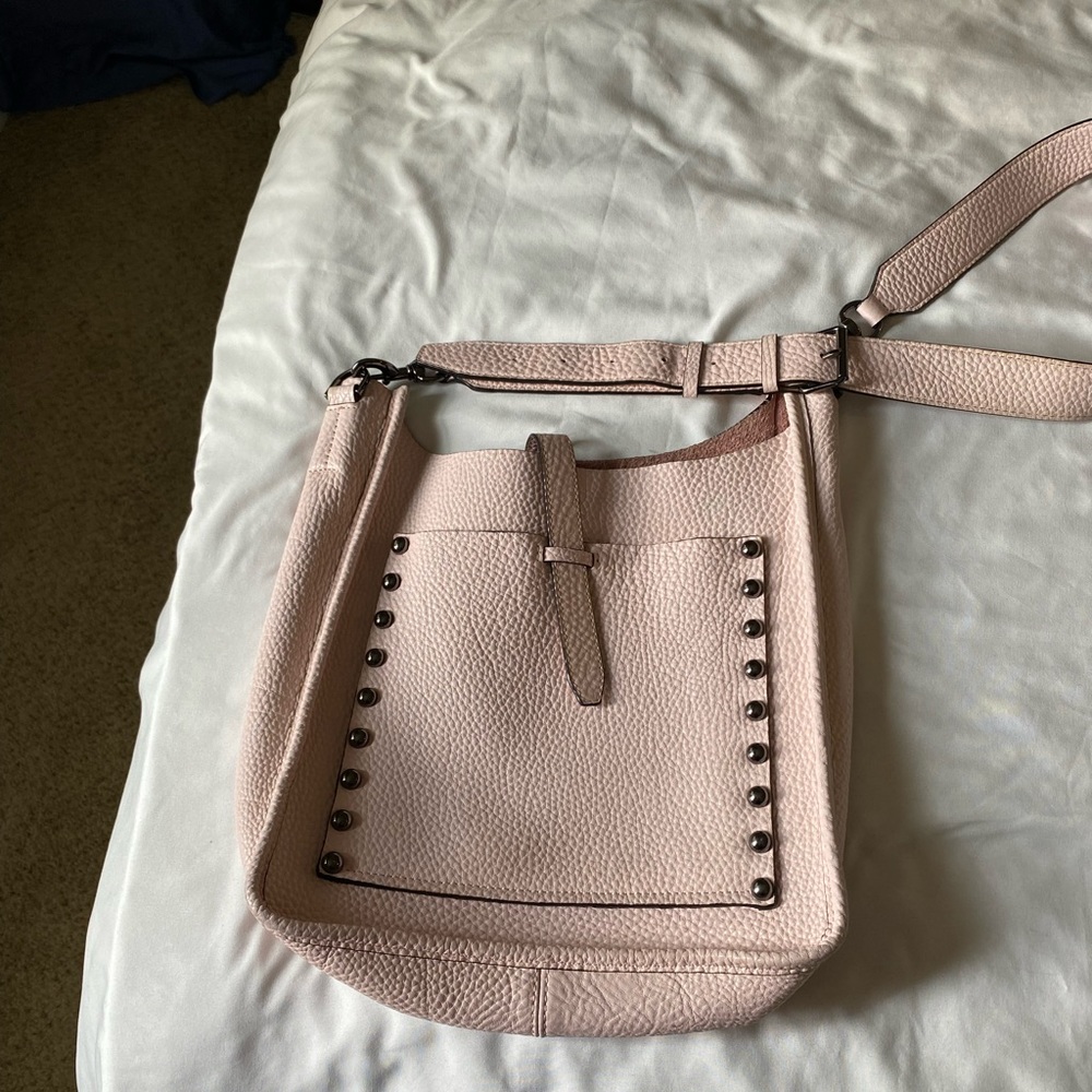 Amazing soft leather light pink crossbody purse. Excellent condition!
